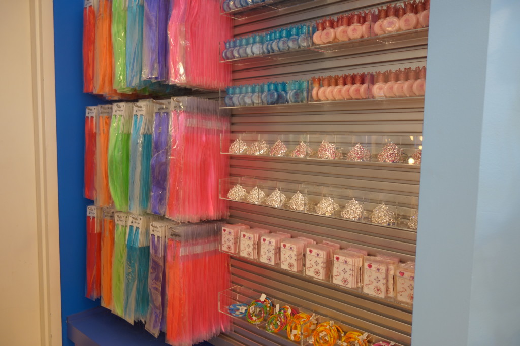 hair extentions, tiaras, nail polish wall at Anna & Elsa's Boutique